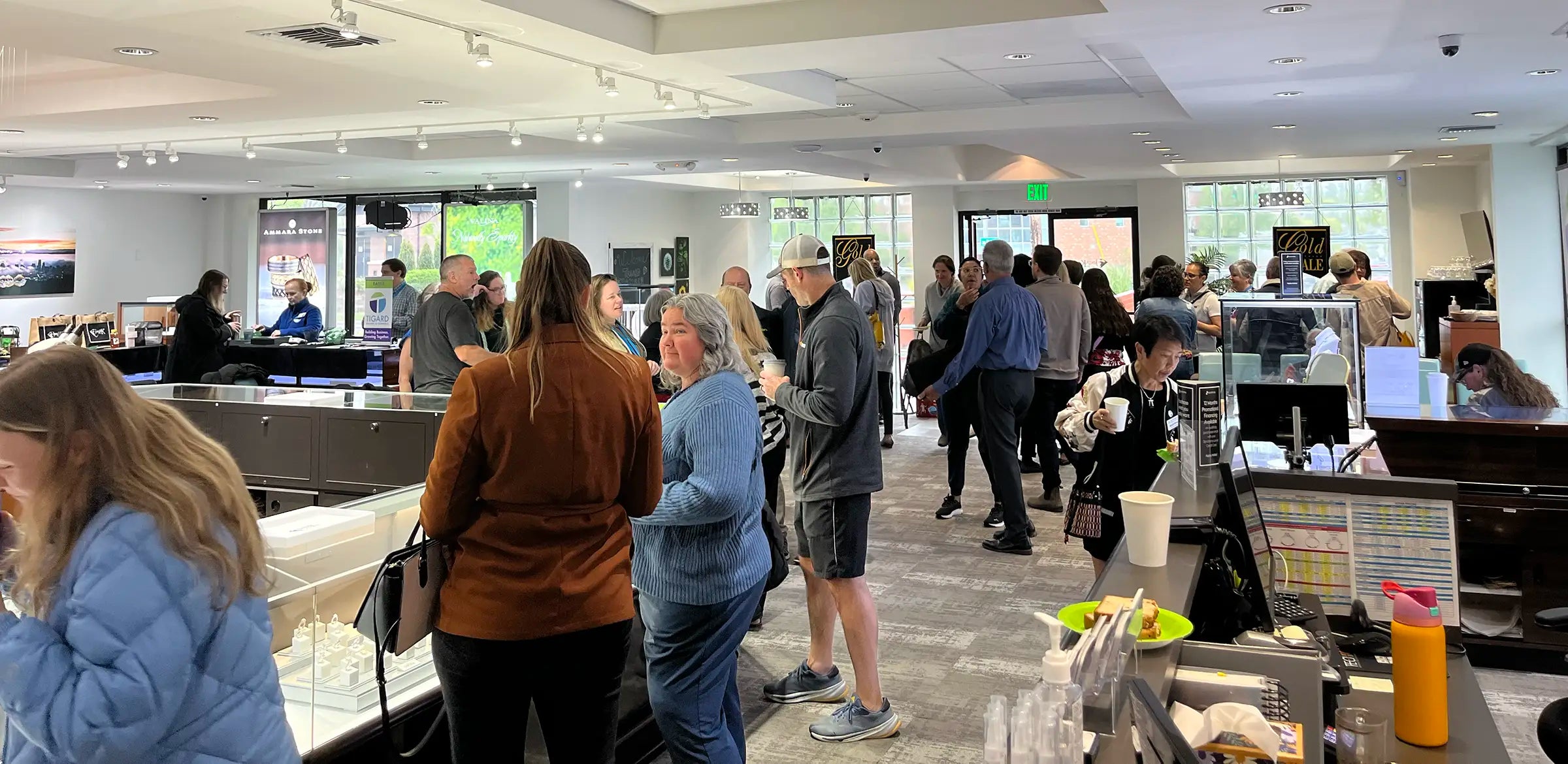 customers inside JosephK Jewelers store on busy day