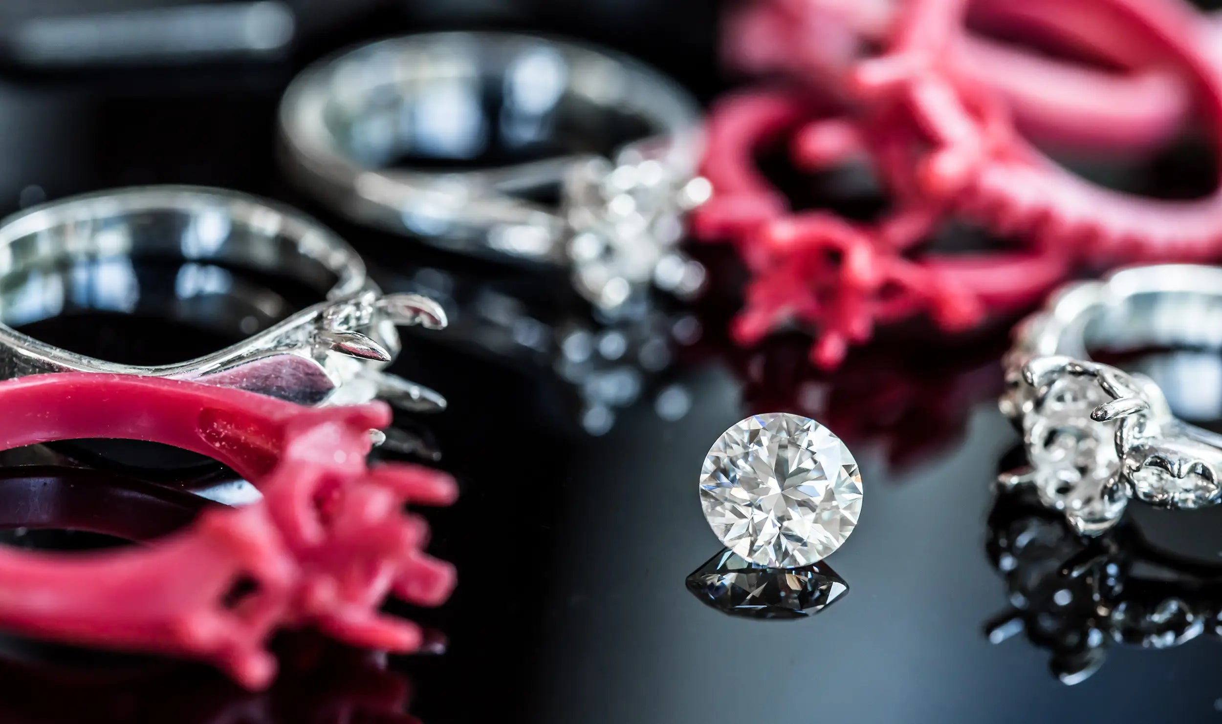 loose diamond and diamond rings displayed at JosephK Jewelers