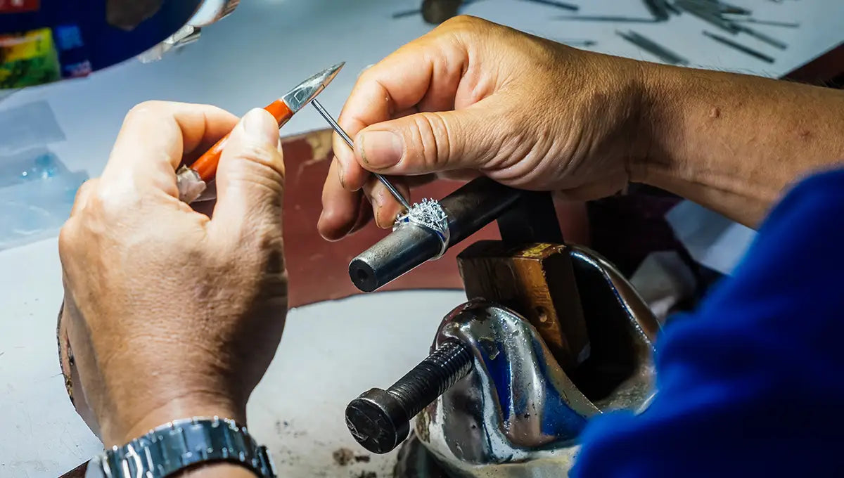 a JosephK jeweler restoring a diamond ring in Westside Portland, Oregon